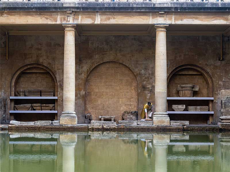 A view of the Great Bath at the Roman Baths museum in Bath, England.